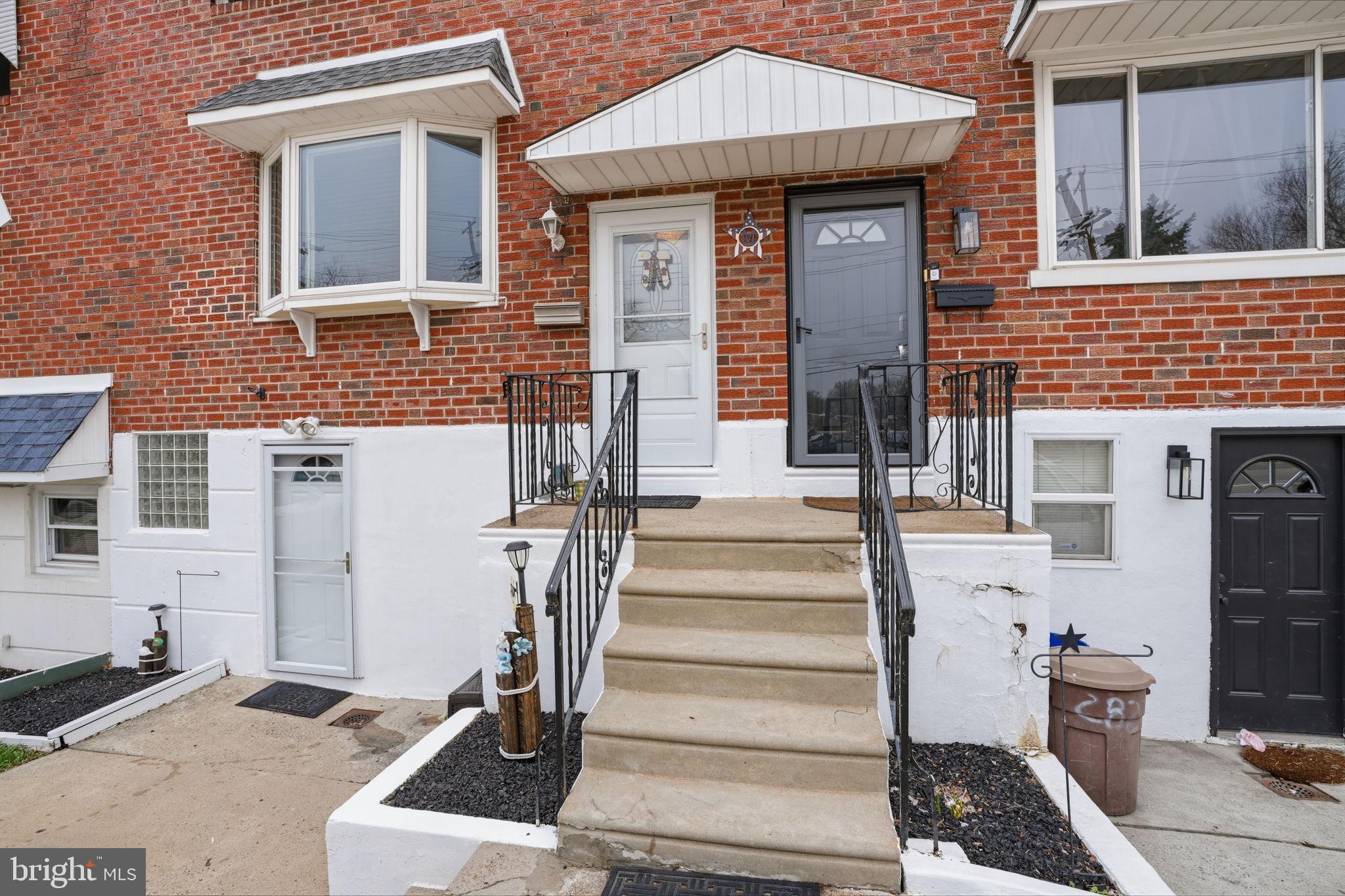 2824 Willits Road Philadelphia, PA 19136 - Photo 2 of 22 a front view of a house with stairs