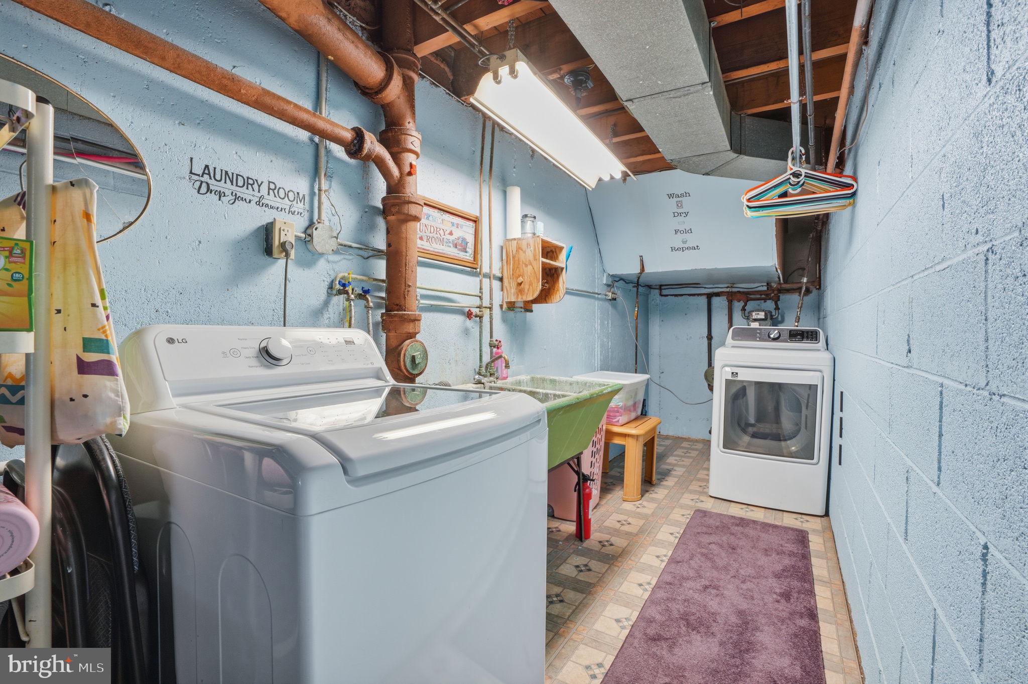 2824 Willits Road Philadelphia, PA 19136 - Photo 21 of 22 a utility room with dryer and washer