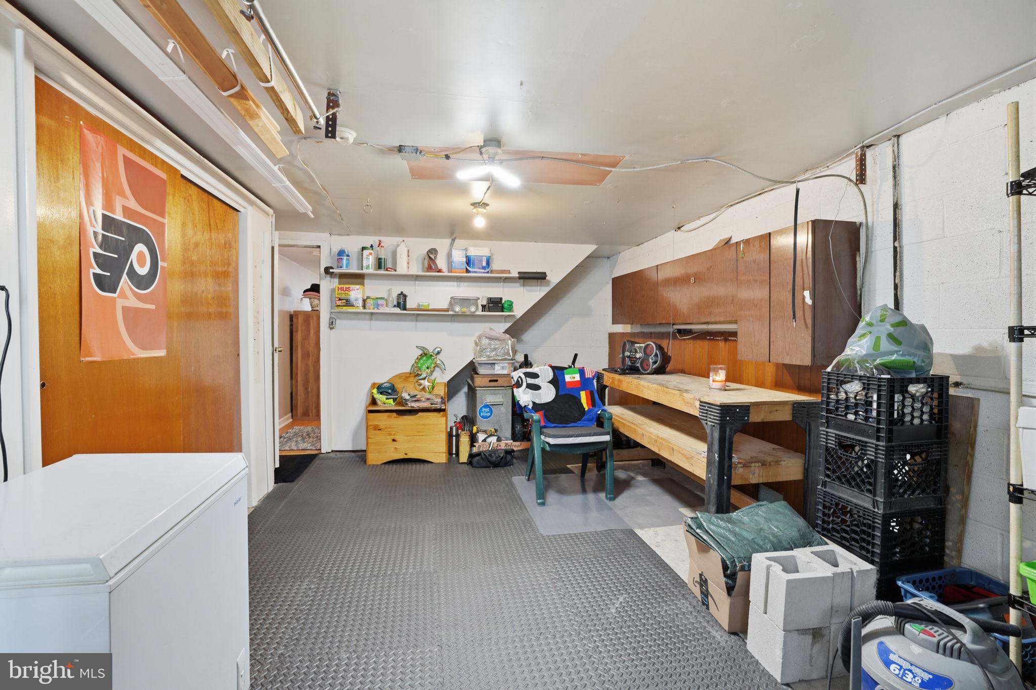 2824 Willits Road Philadelphia, PA 19136 - Photo 22 of 22 a garage with table and chairs