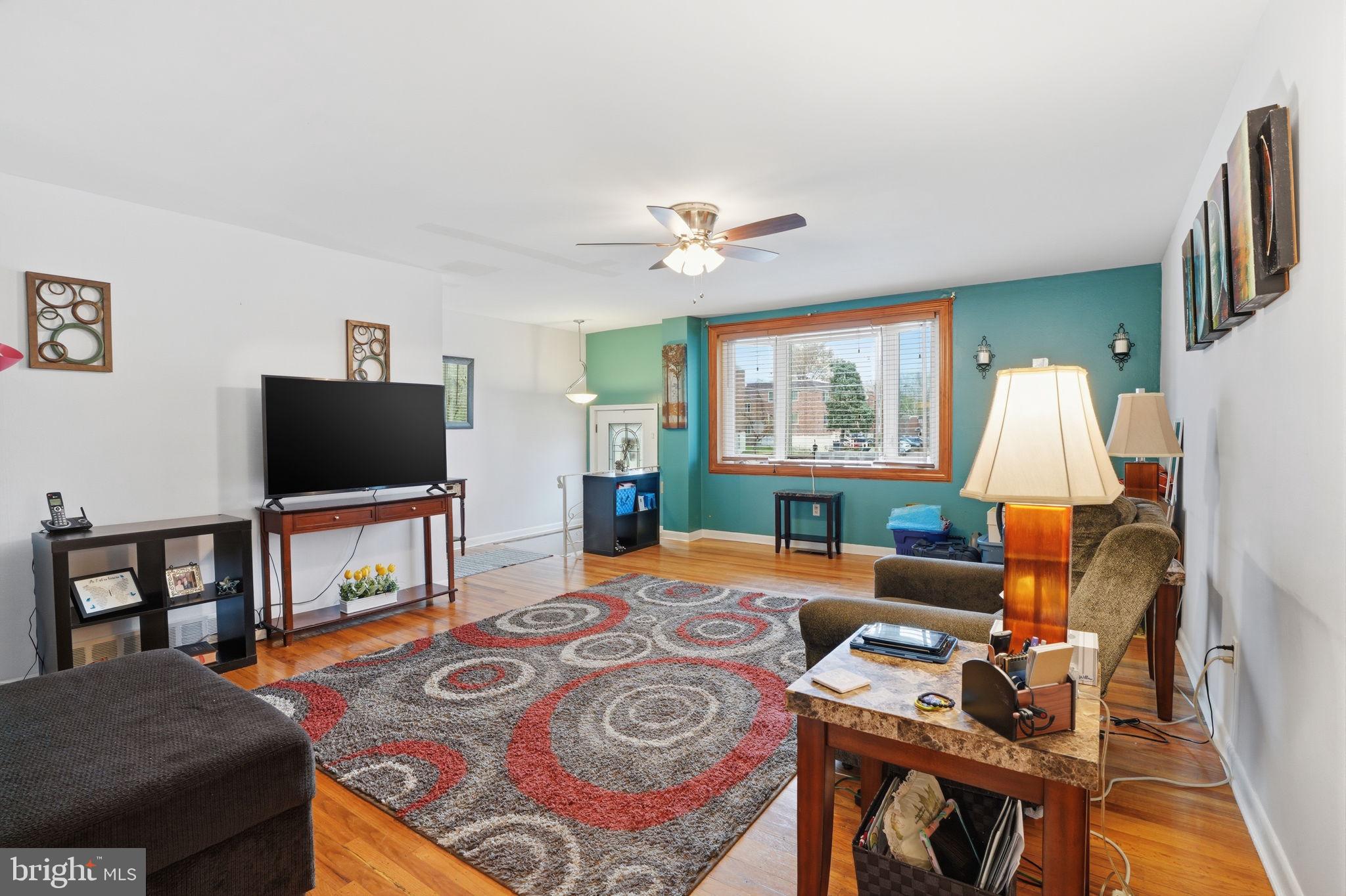 2824 Willits Road Philadelphia, PA 19136 - Photo 4 of 22 a living room with furniture and a flat screen tv