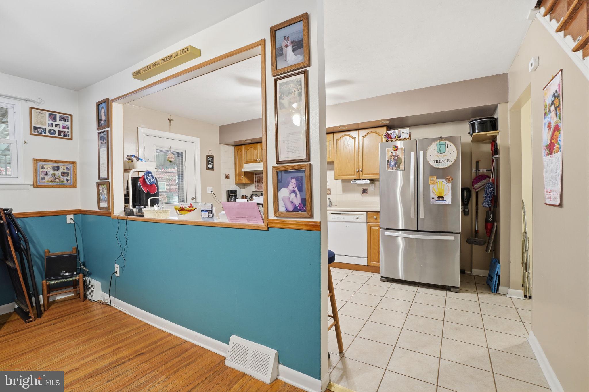 2824 Willits Road Philadelphia, PA 19136 - Photo 6 of 22 a kitchen with stainless steel appliances granite countertop a refrigerator and a stove top oven