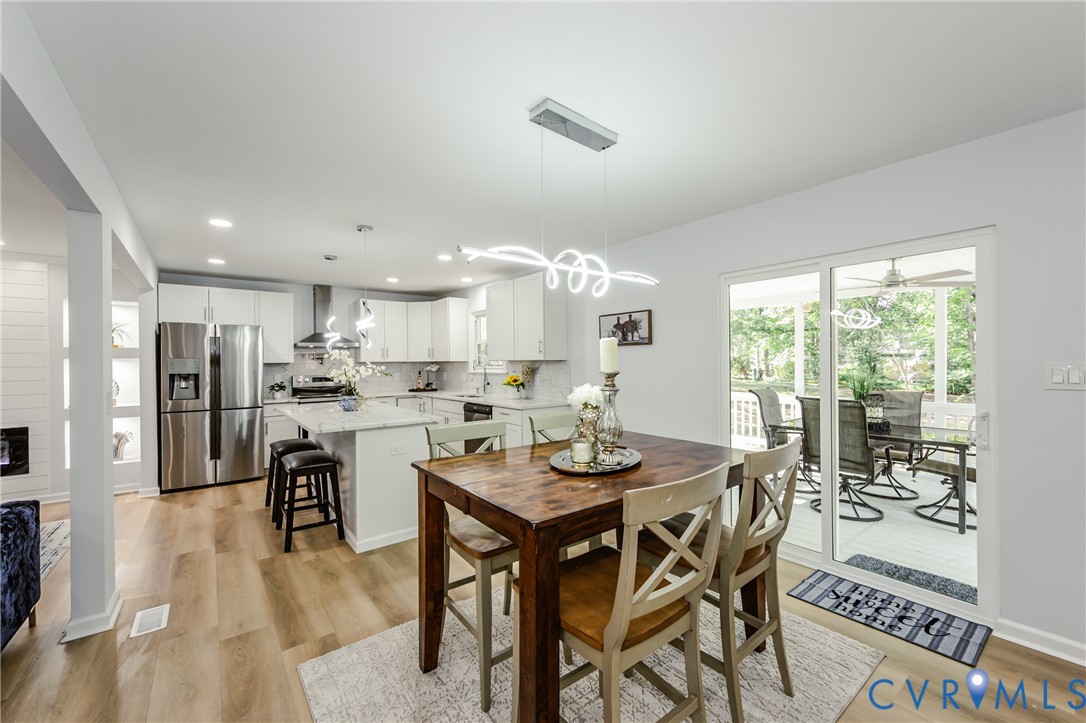 9514 Riddle Road Chesterfield, VA 23832 - Photo 18 of 50 Dining space with light wood finished floors and r