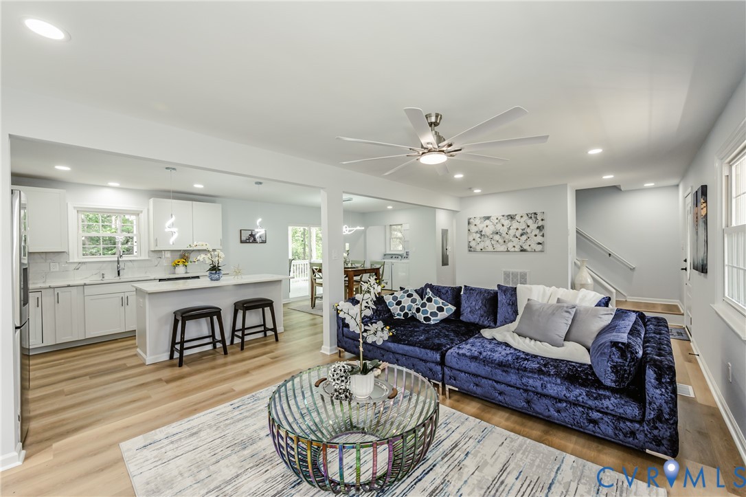 9514 Riddle Road Chesterfield, VA 23832 - Photo 20 of 50 Living room featuring recessed lighting, light woo
