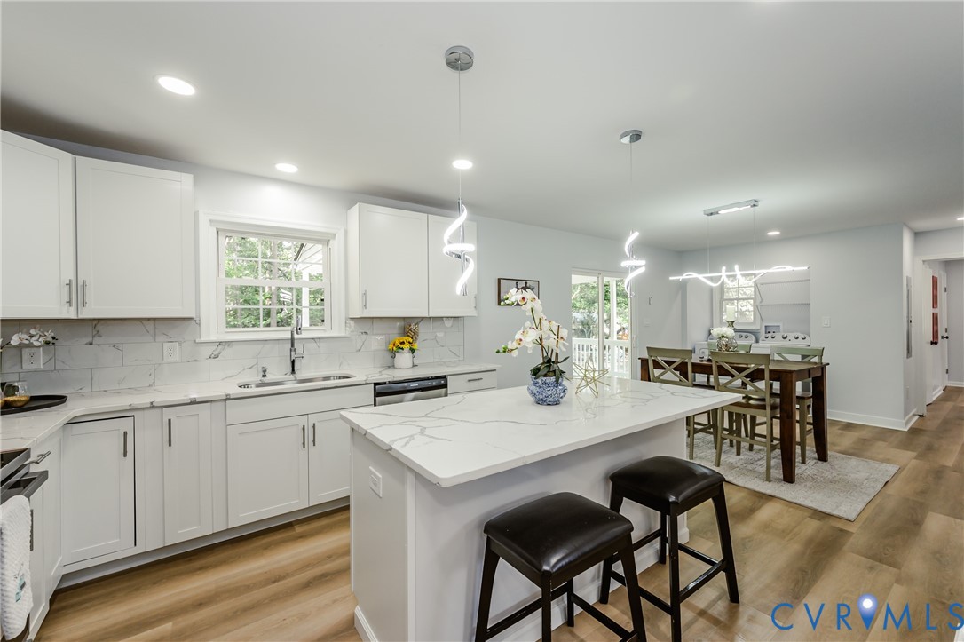 9514 Riddle Road Chesterfield, VA 23832 - Photo 21 of 50 Kitchen with decorative light fixtures, white cabi