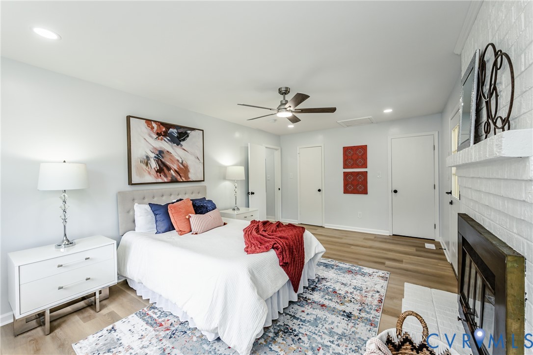 9514 Riddle Road Chesterfield, VA 23832 - Photo 26 of 50 Bedroom featuring recessed lighting, a brick firep