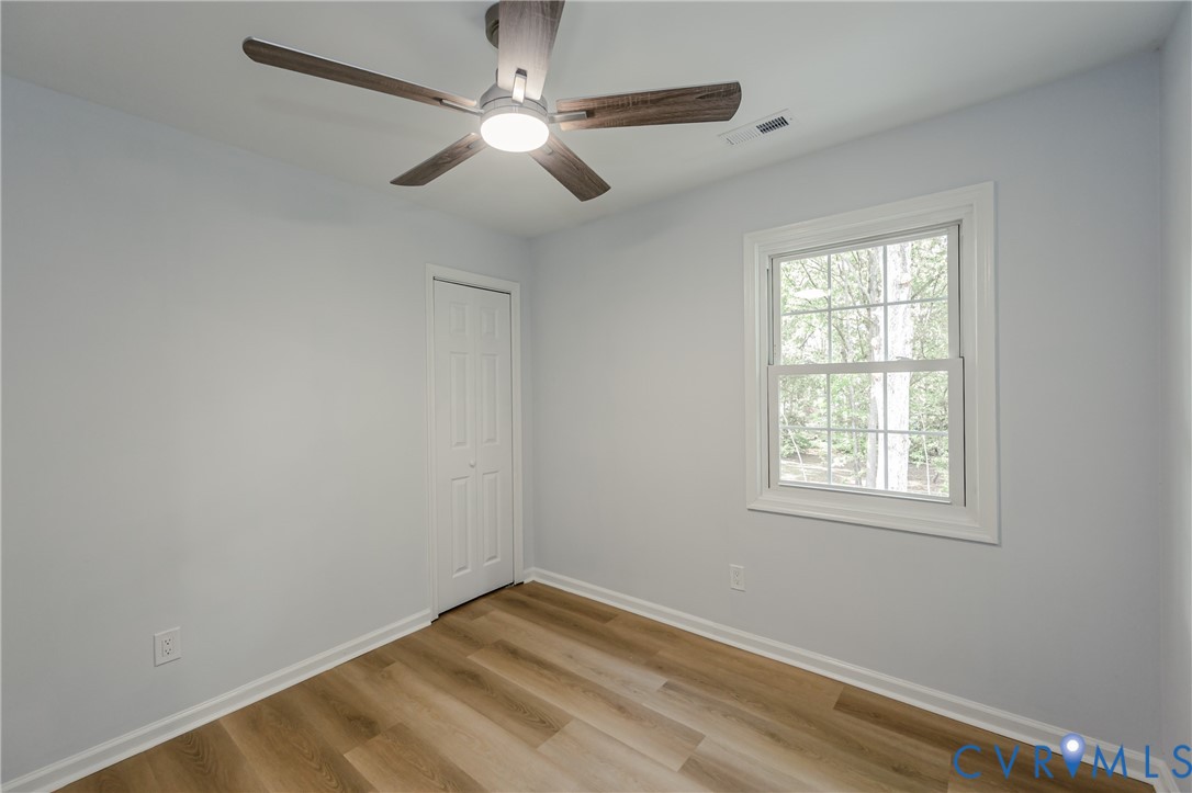 9514 Riddle Road Chesterfield, VA 23832 - Photo 32 of 50 Unfurnished bedroom featuring light wood-style flo