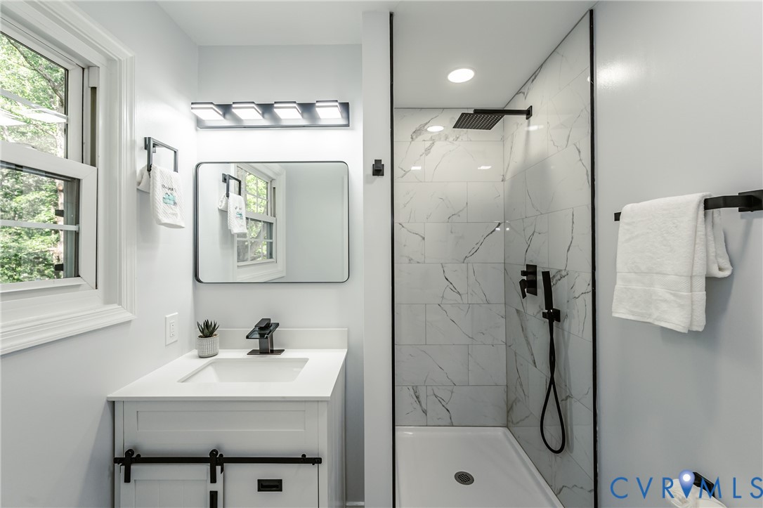 9514 Riddle Road Chesterfield, VA 23832 - Photo 39 of 50 Bathroom featuring vanity and a marble finish show