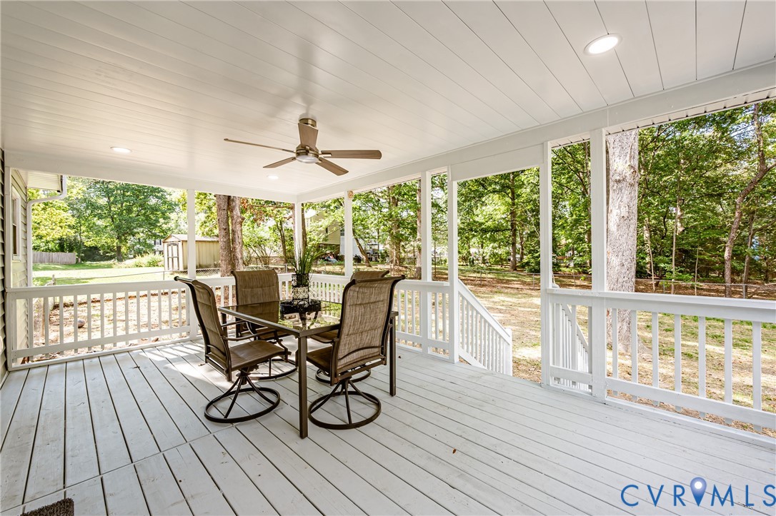 9514 Riddle Road Chesterfield, VA 23832 - Photo 45 of 50 Deck with outdoor dining area and a ceiling fan