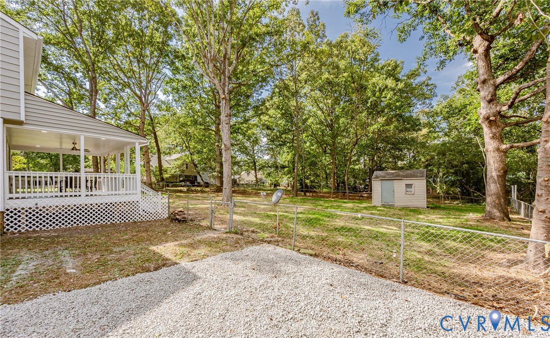 9514 Riddle Road Chesterfield, VA 23832 - Photo 5 of 50 View of yard featuring view of scattered trees, a
