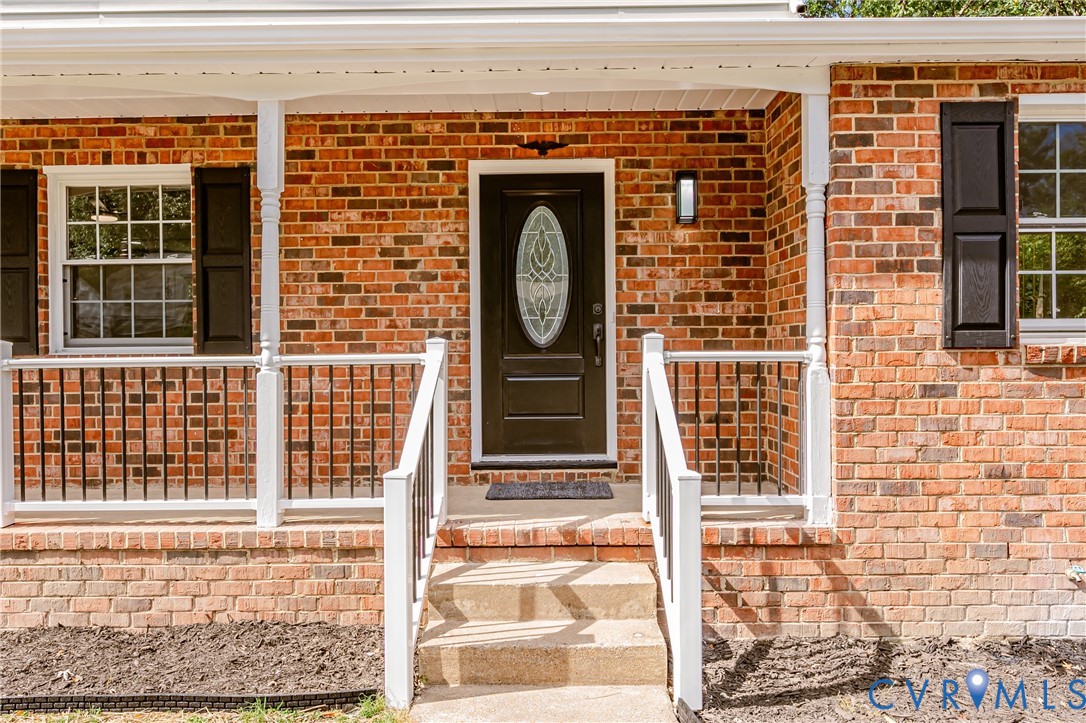 9514 Riddle Road Chesterfield, VA 23832 - Photo 6 of 50 Entrance to property featuring covered porch and b