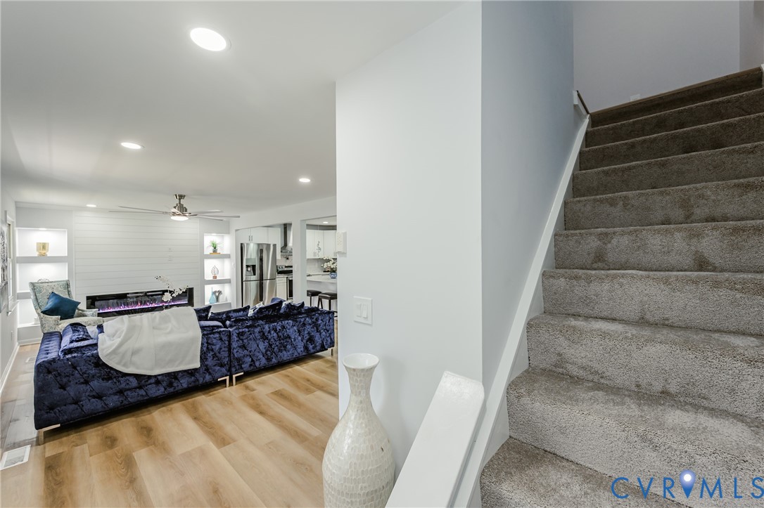 9514 Riddle Road Chesterfield, VA 23832 - Photo 8 of 50 Stairs with recessed lighting, wood finished floor