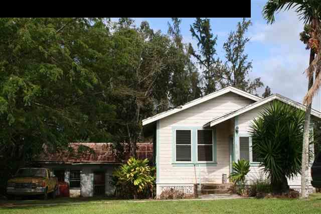 421 West Kuiaha Road Haiku, HI 96708 - Photo 1 of 4 a front view of a house with a yard