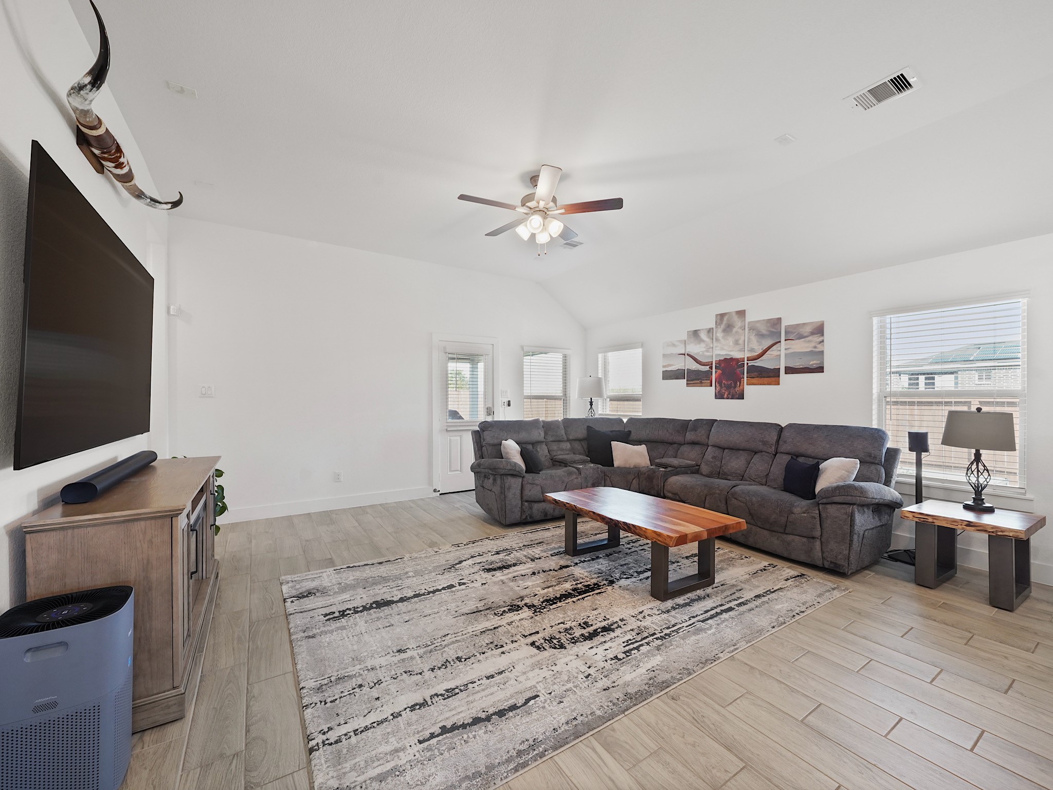 9 Alyssa Palms Drive Manvel, TX 77578 - Photo 11 of 30 a living room with furniture and a flat screen tv
