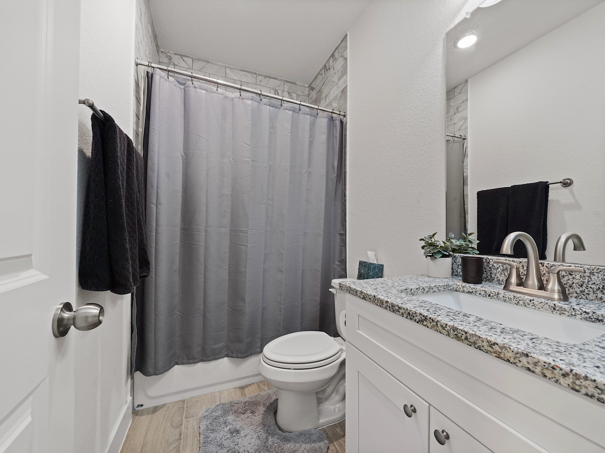 9 Alyssa Palms Drive Manvel, TX 77578 - Photo 16 of 30 a bathroom with a granite countertop sink toilet and shower
