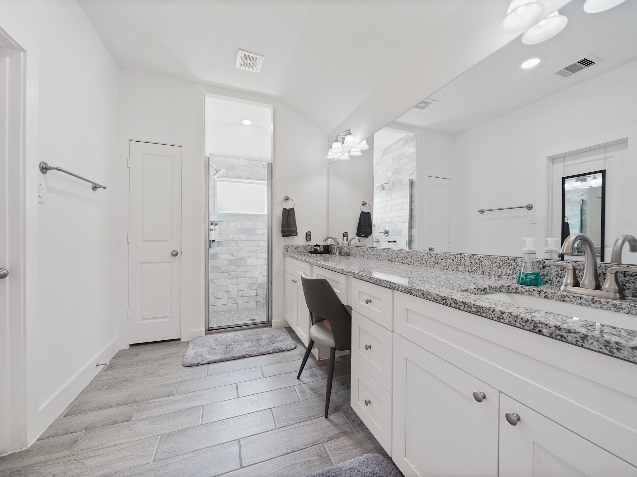 9 Alyssa Palms Drive Manvel, TX 77578 - Photo 21 of 30 a bathroom with a granite countertop sink mirror and a shower