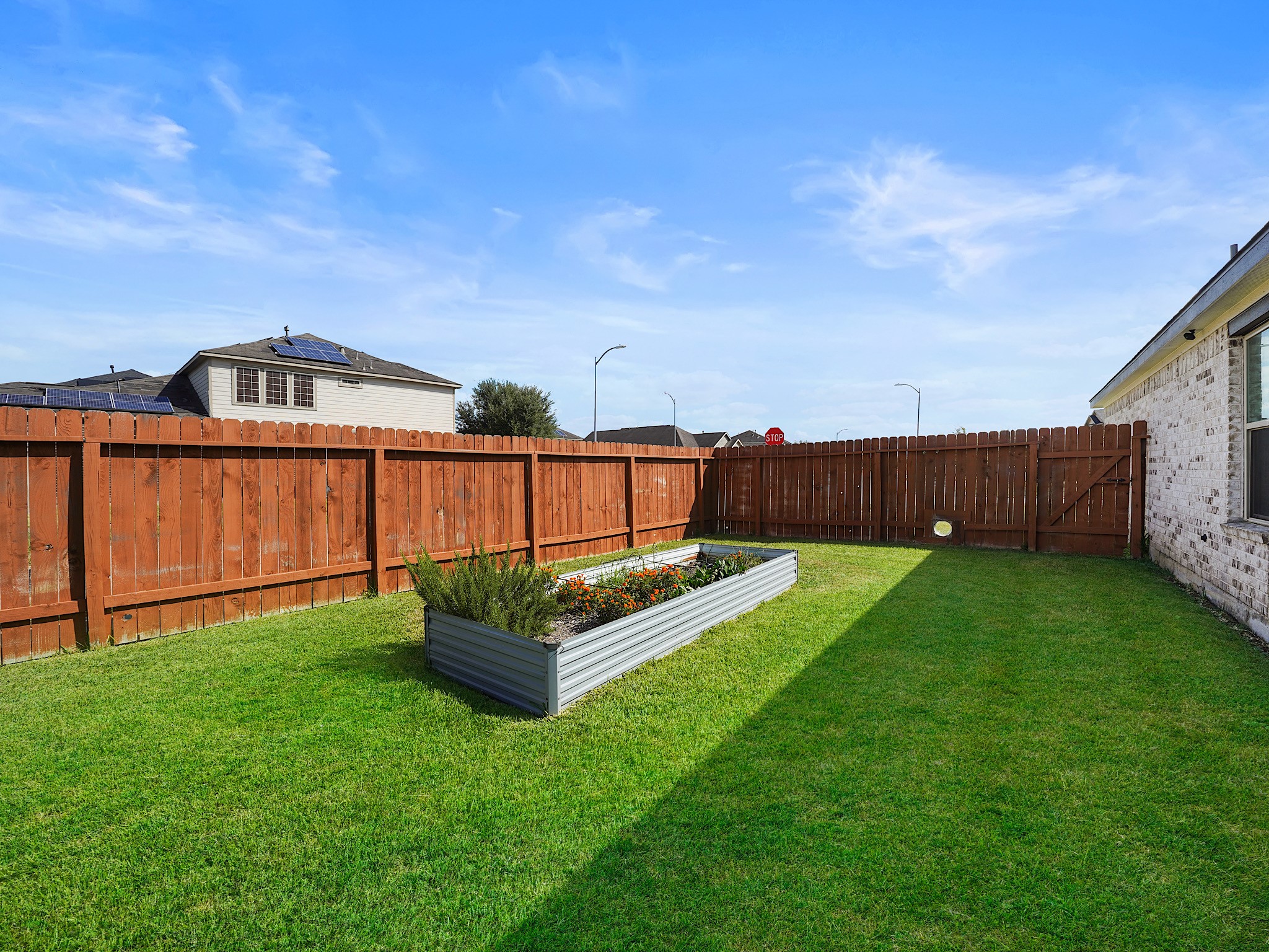 9 Alyssa Palms Drive Manvel, TX 77578 - Photo 27 of 30 a view of a backyard with garden