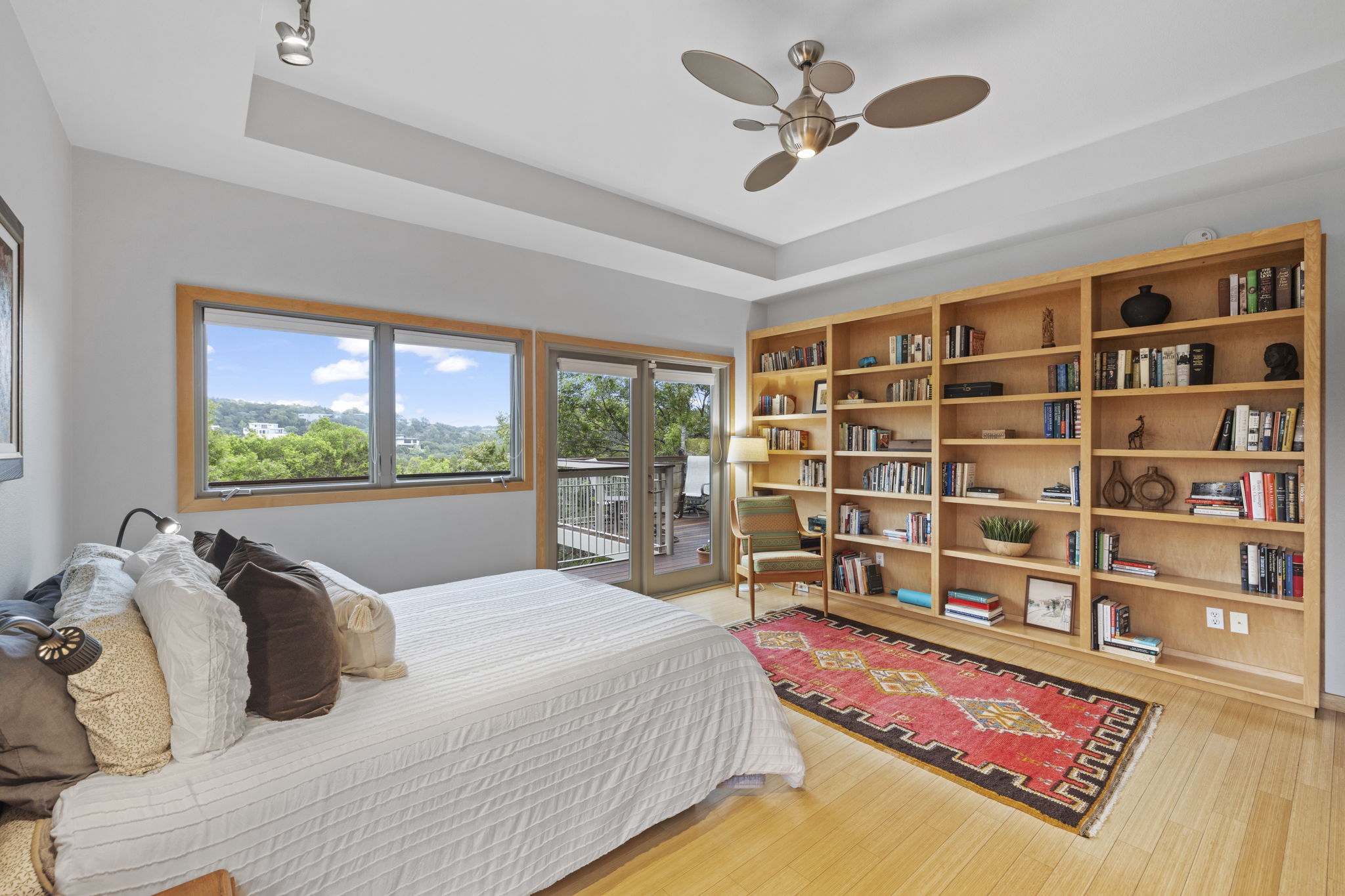701 Yaupon Valley Road West Lake Hills, TX 78746 - Photo 17 of 40 A sliding door provides access to the wraparound deck.