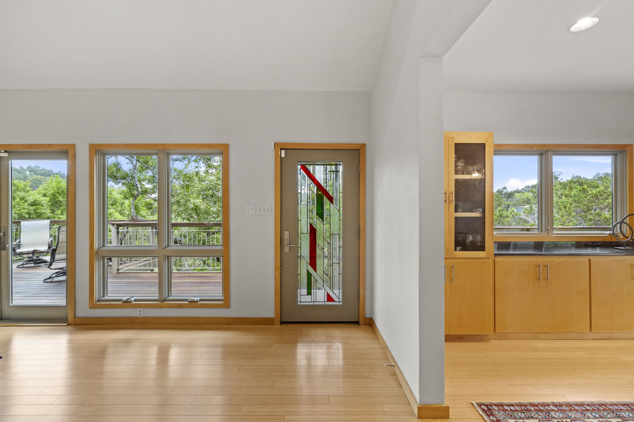 701 Yaupon Valley Road West Lake Hills, TX 78746 - Photo 3 of 40 Custom glass entry door makes a great first impression.