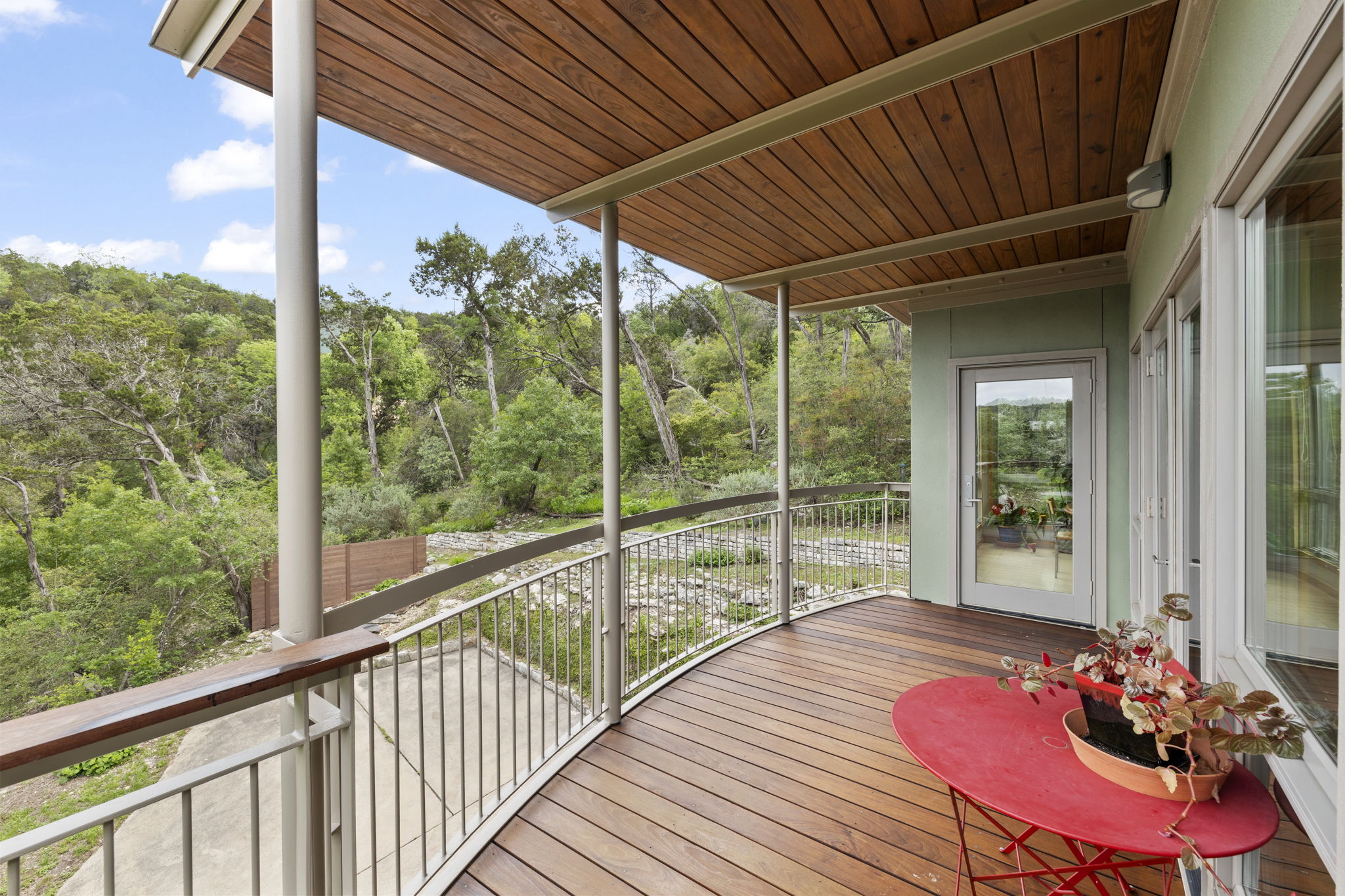 701 Yaupon Valley Road West Lake Hills, TX 78746 - Photo 32 of 40 This is part of the wraparound deck over the garage off the dining area. A lovely spot to enjoy morning coffee.
