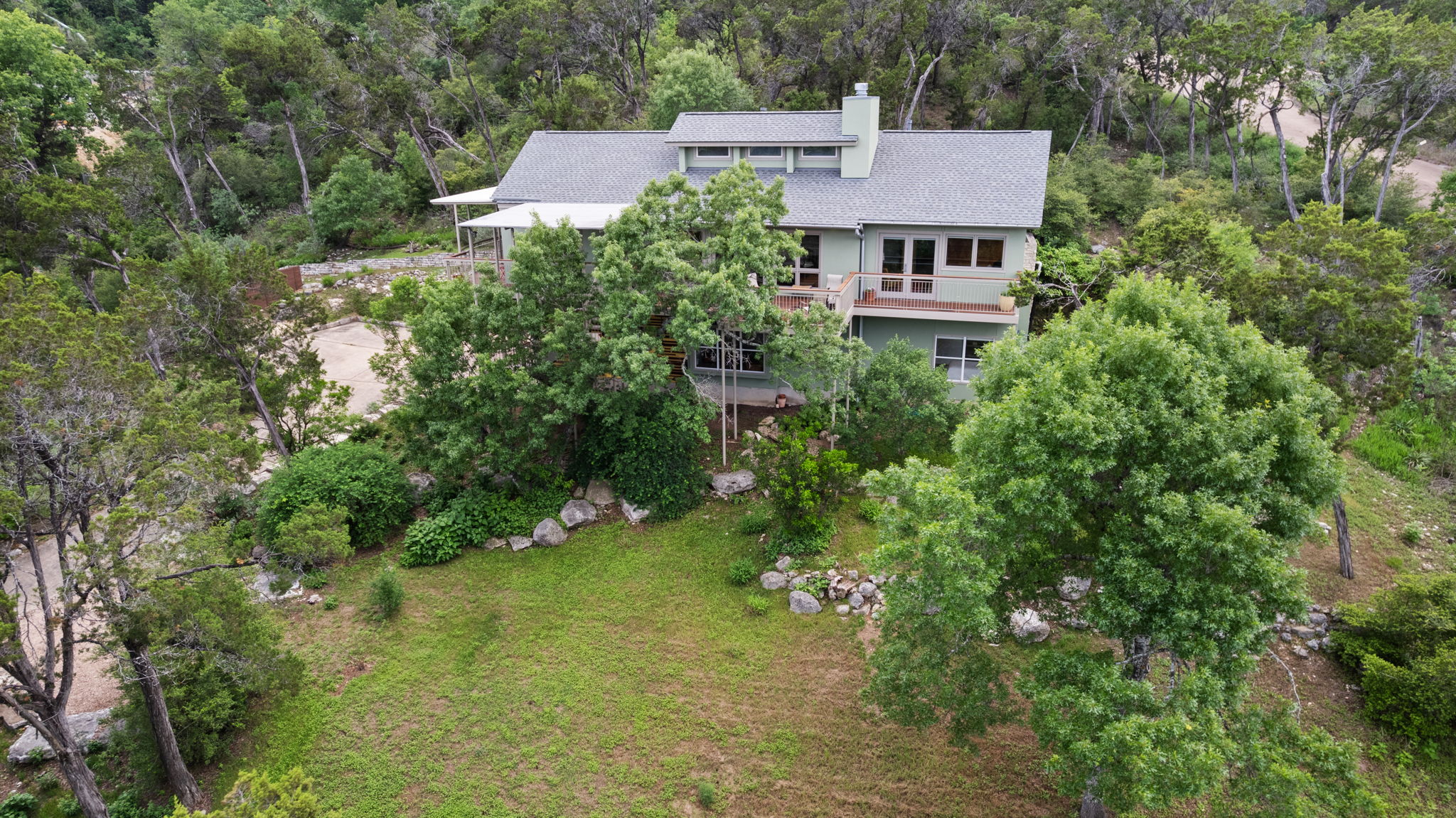 701 Yaupon Valley Road West Lake Hills, TX 78746 - Photo 37 of 40 Front view of the home showing the front yard almost to the street.