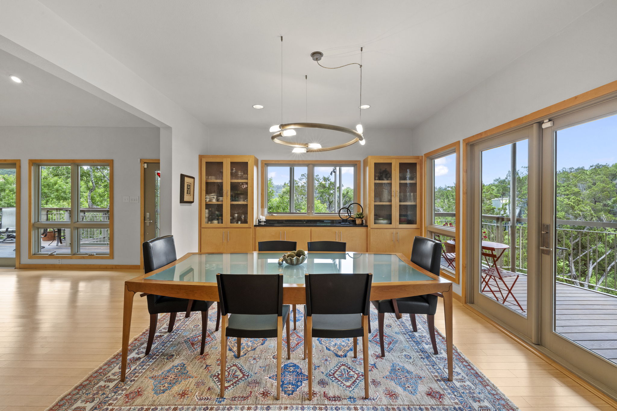 701 Yaupon Valley Road West Lake Hills, TX 78746 - Photo 8 of 40 Formal dining room with high-end lighting and built-in cabinetry