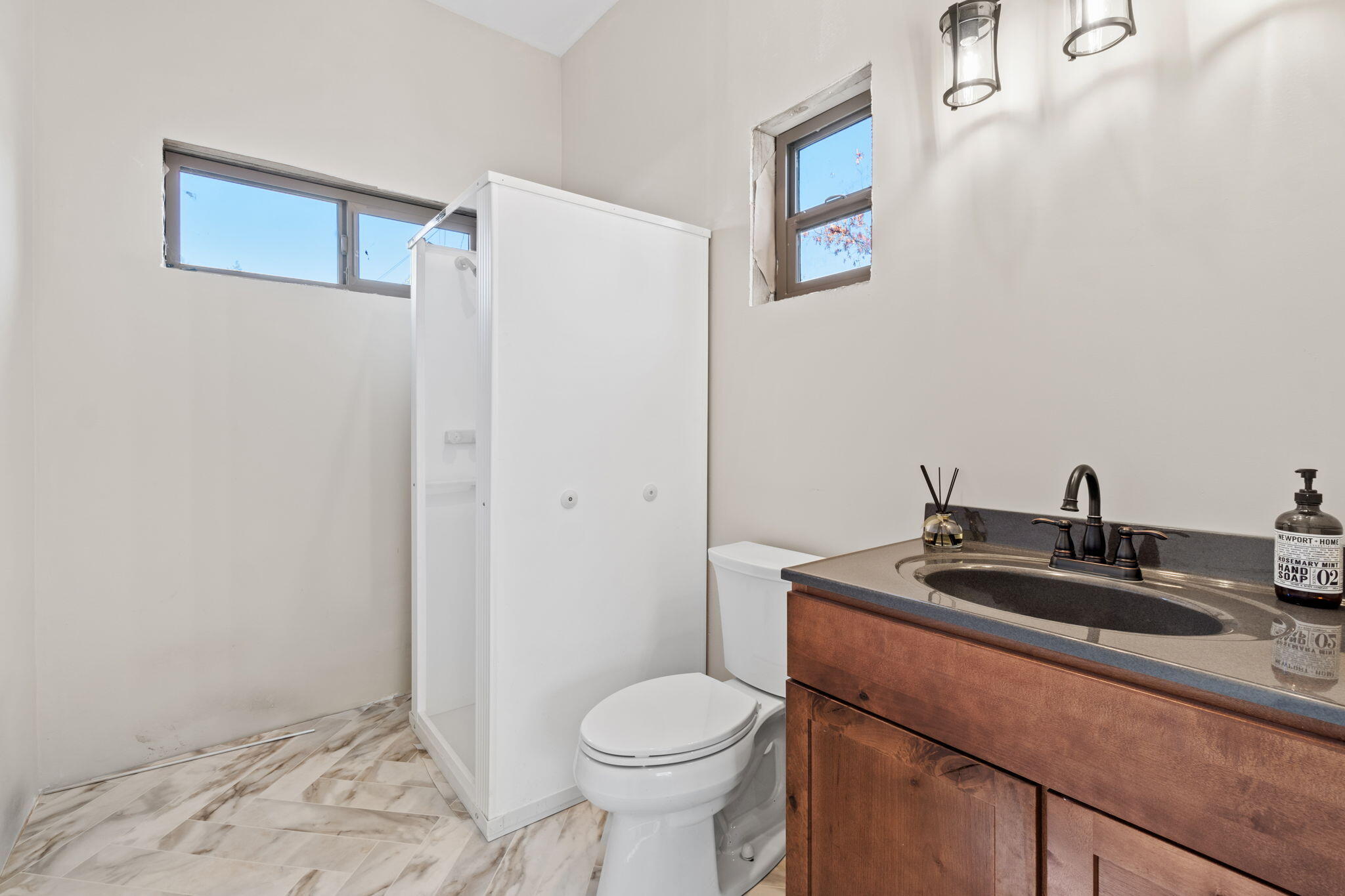 61 Kingston Road Fieldbrook, CA 95519 - Photo 16 of 48 a bathroom with a sink toilet and vanity