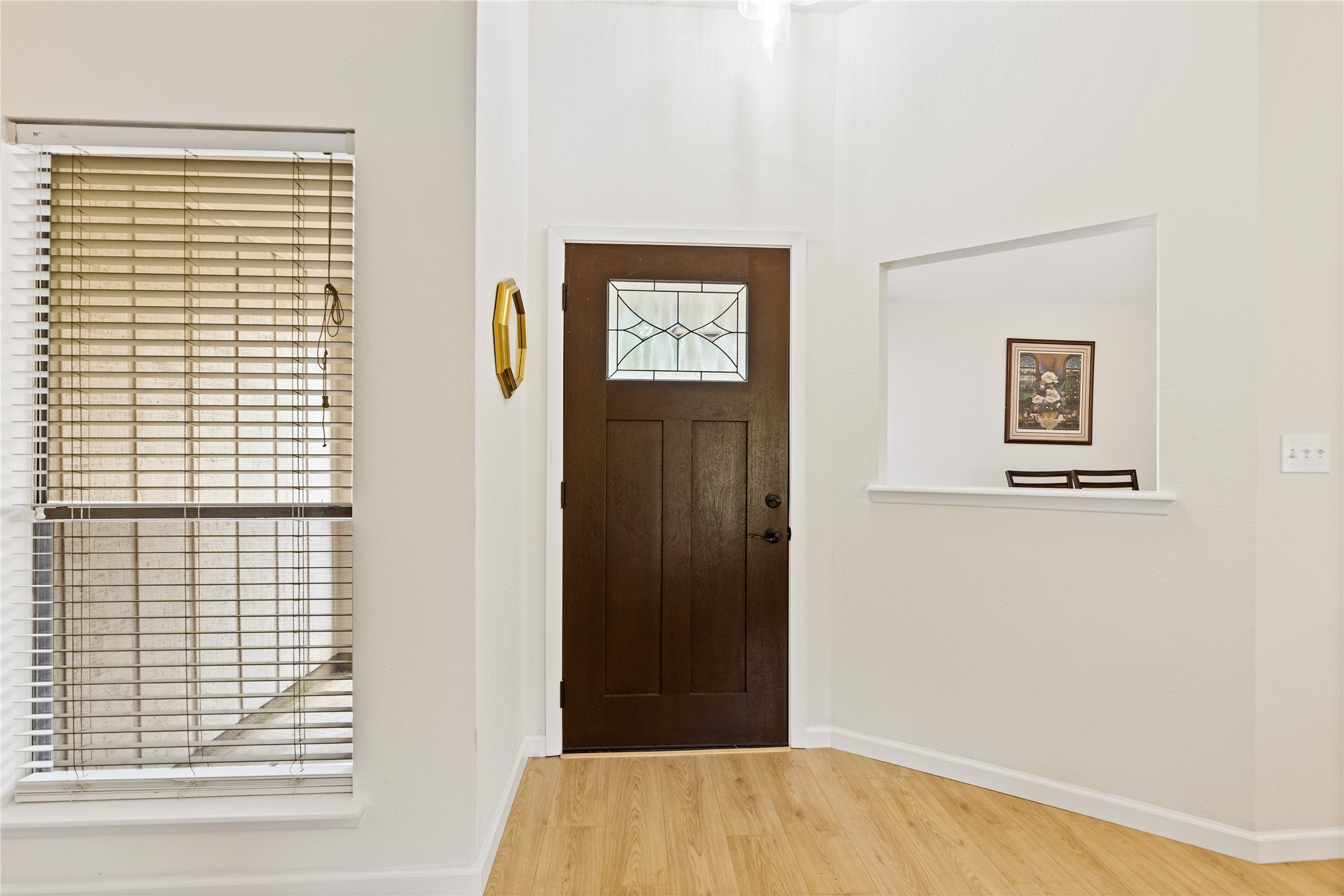 9719 Orangevale Drive Spring, TX 77379 - Photo 18 of 32 Front entrance with large windows and attractive wood flooring.