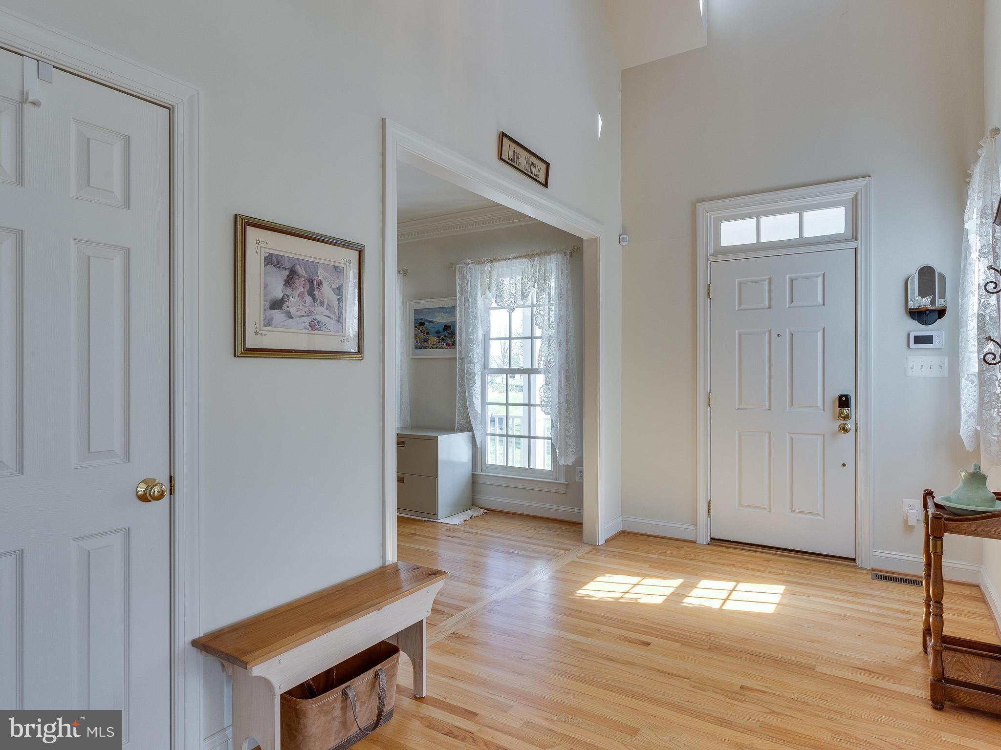 15013 Rolling Ridge Road Haymarket, VA 20169 - Photo 16 of 30 Walk onto Gleaming Hardwood Floors
