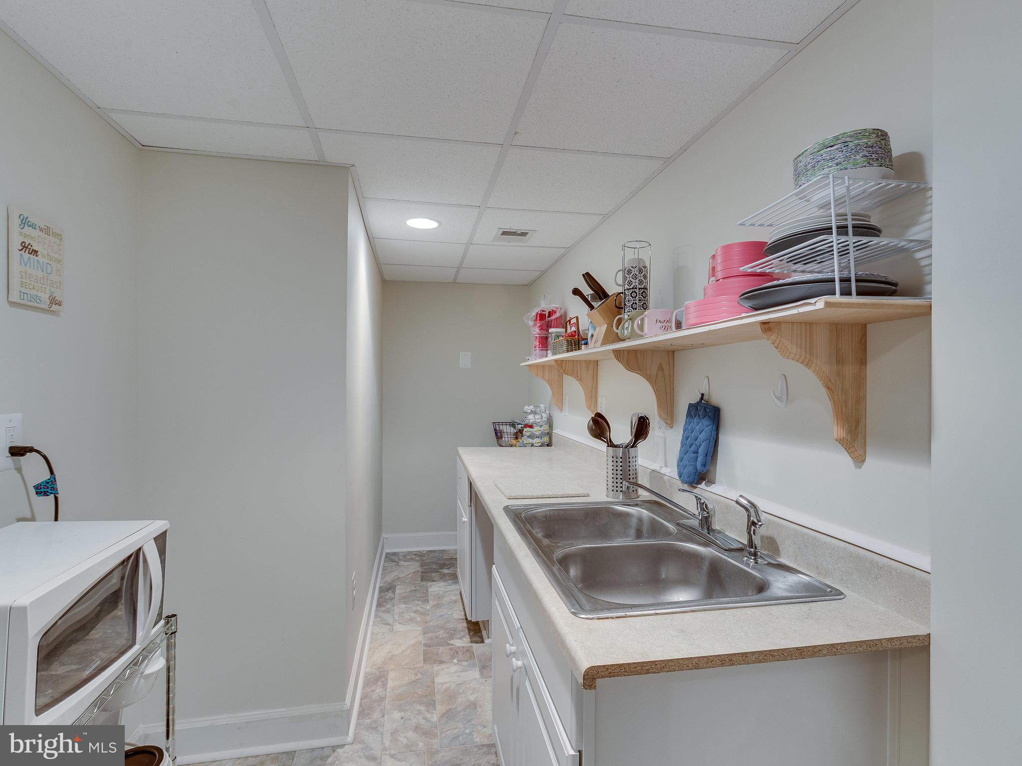 15013 Rolling Ridge Road Haymarket, VA 20169 - Photo 19 of 30 Kitchenette in Basement w/Extra Fridge