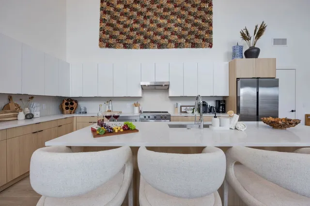 a bedroom with a bed and a couch