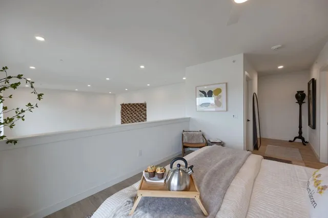 a bathroom with a toilet and a shower curtain