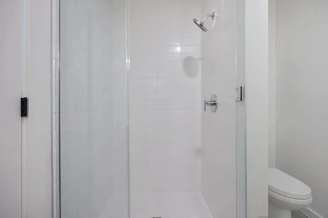 a view of a house with pool and chairs