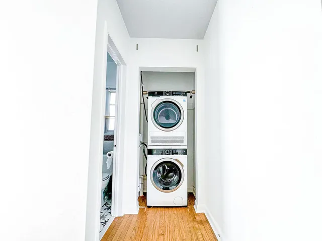 a utility room with dryer and washer