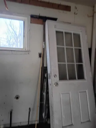 a kitchen with a stove and a refrigerator