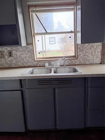 a living room with a fireplace