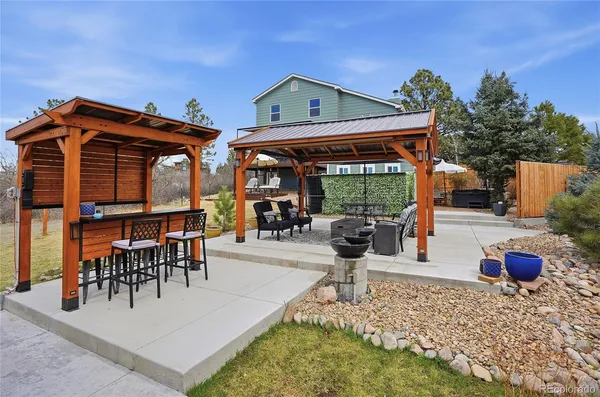 a front view of a house with swimming pool