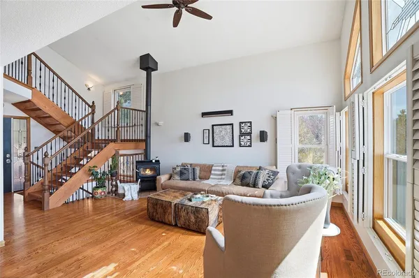 a living room with furniture and a table