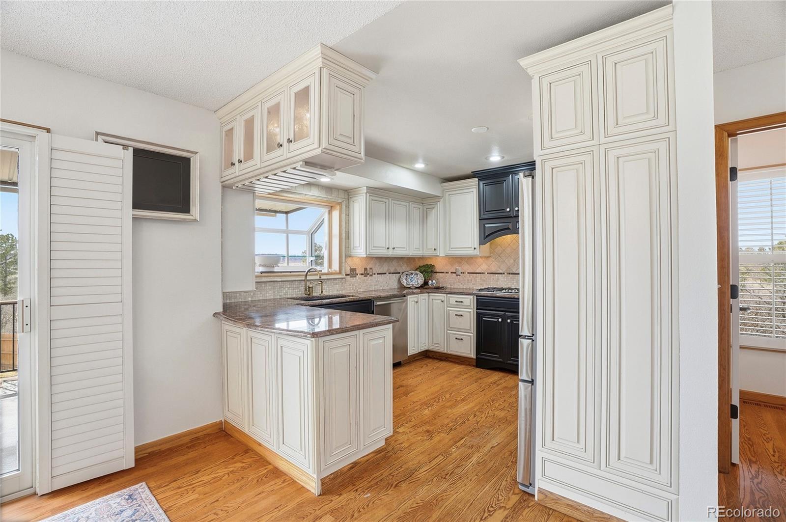 7315 Rafter Road Franktown, CO 80116 - Photo 8 of 49 Gallery Image 8