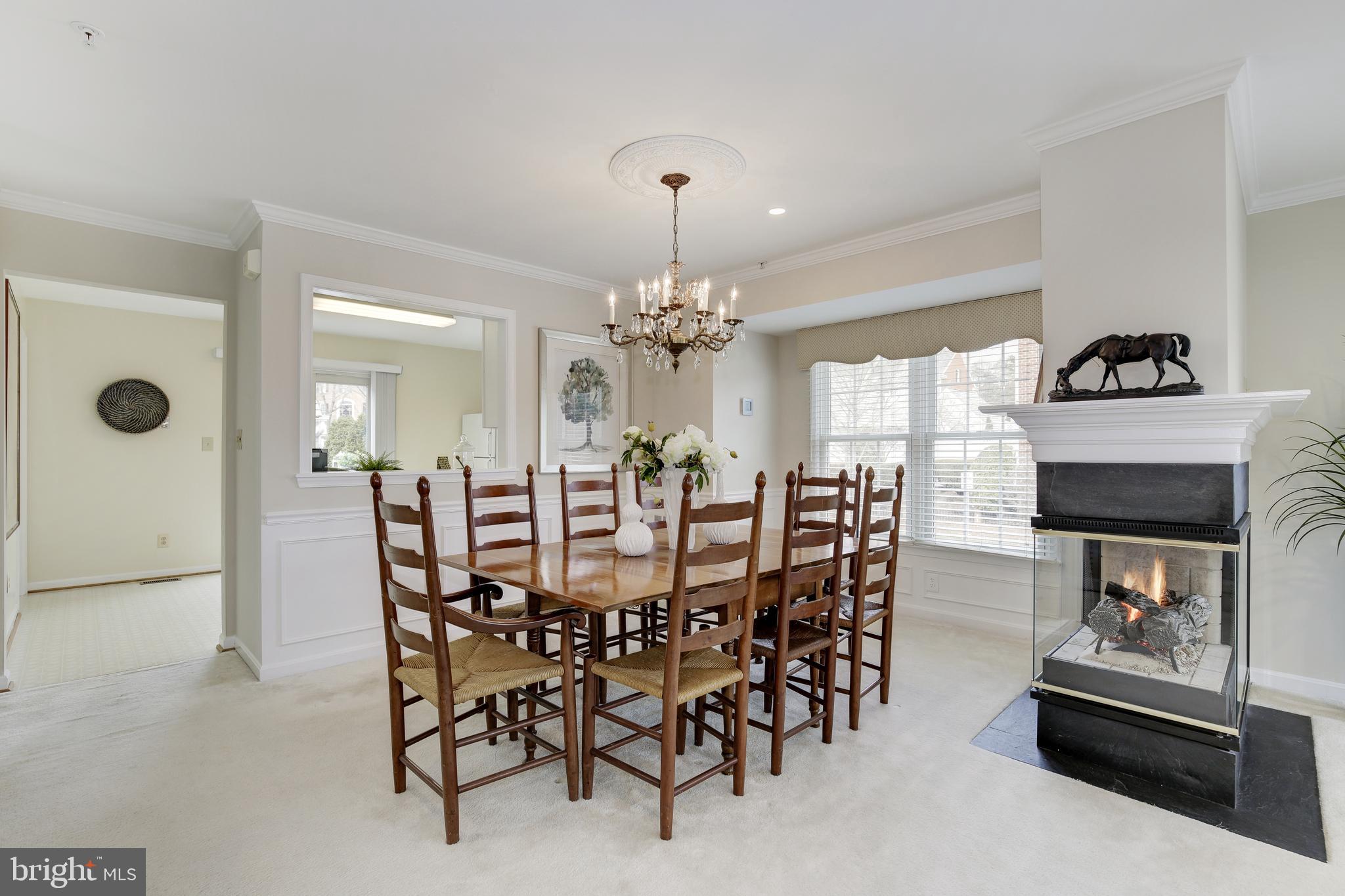 484 Tschiffely Square Road Gaithersburg, MD 20878 - Photo 9 of 27 Dining Room w/Triple Sided Gas Fireplace