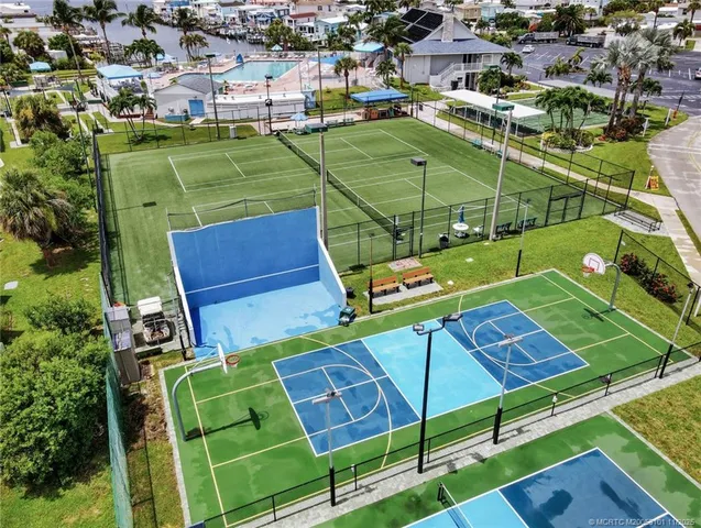 swimming pool view with a garden space
