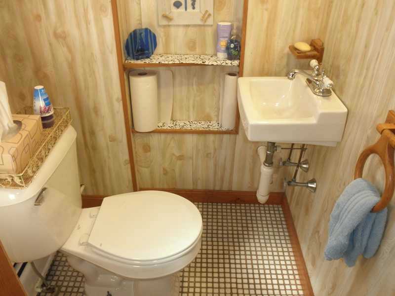 24 Swan Road Smithfield, RI 02917 - Photo 22 of 24 Bathroom. Lower Level 1/2 Bath!