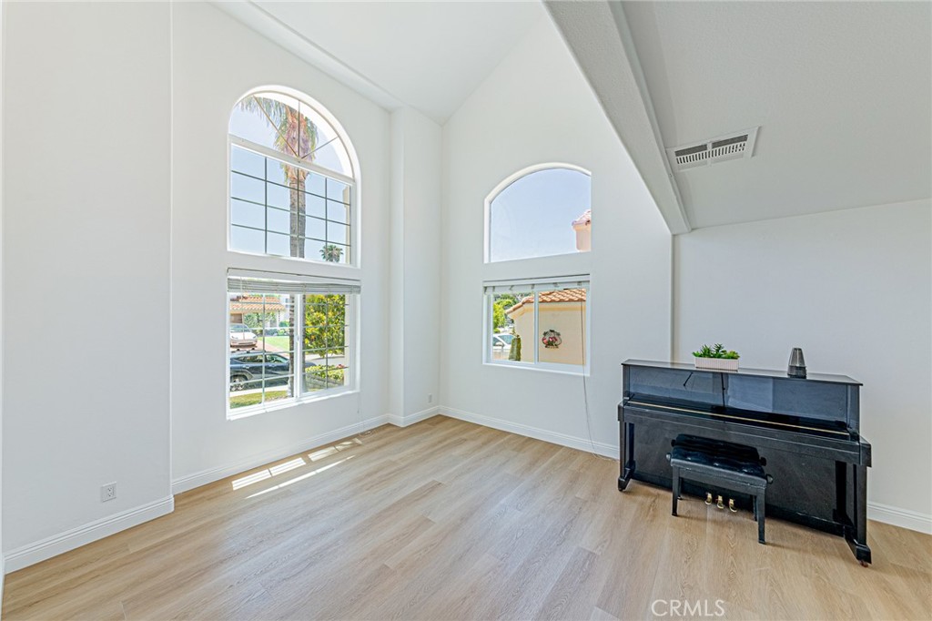 25533 Longfellow Place Stevenson Ranch, CA 91381 - Photo 4 of 47 a workspace with furniture and a window