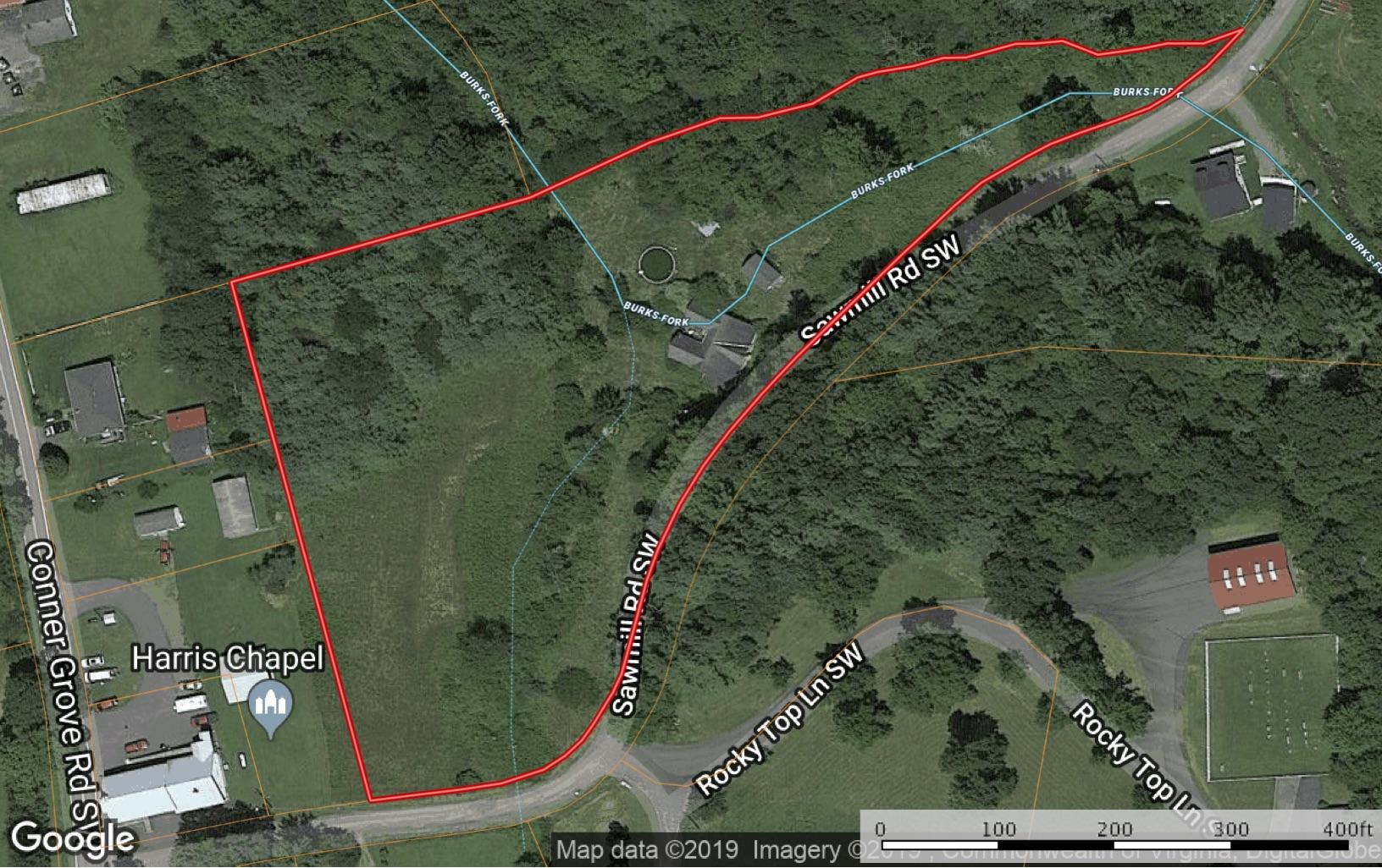 170 Sawmill Road Southwest Willis, VA 24380 - Photo 1 of 3 an aerial view of a tennis court