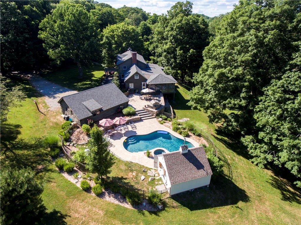 82 Goose Hill Road Chester, CT 06412 - Photo 1 of 1 an aerial view of a house with yard swimming pool and outdoor seating