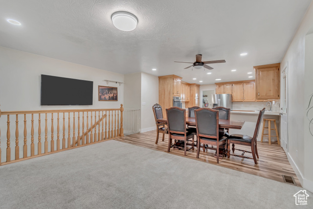 1225 North 1380th Street West Mapleton, UT 84664 - Photo 5 of 18 Dining area featuring a ceiling fan, light colored carpet, recessed lighting, and light wood-type flooring