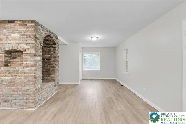 a view of an empty room and window