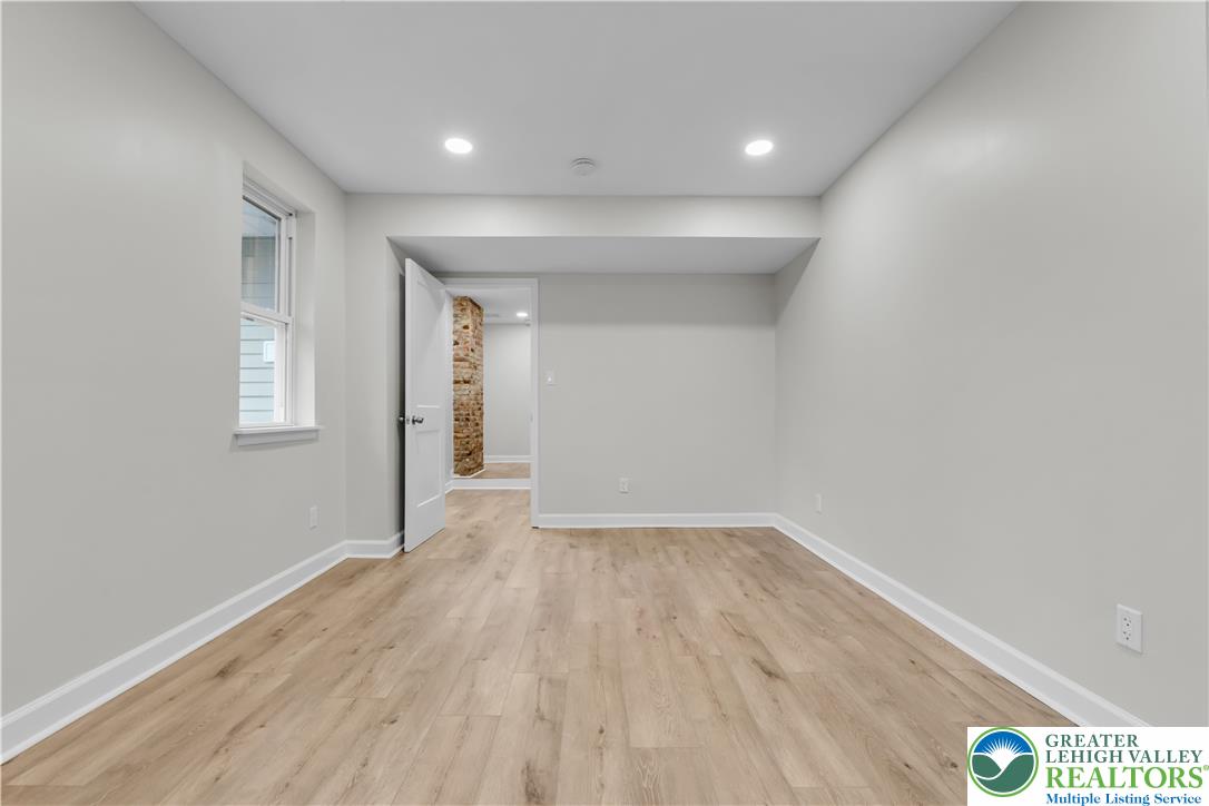 4453 Old Bethlehem Pike Center Valley, PA 18034 - Photo 14 of 28 wooden floor in an empty room with a window