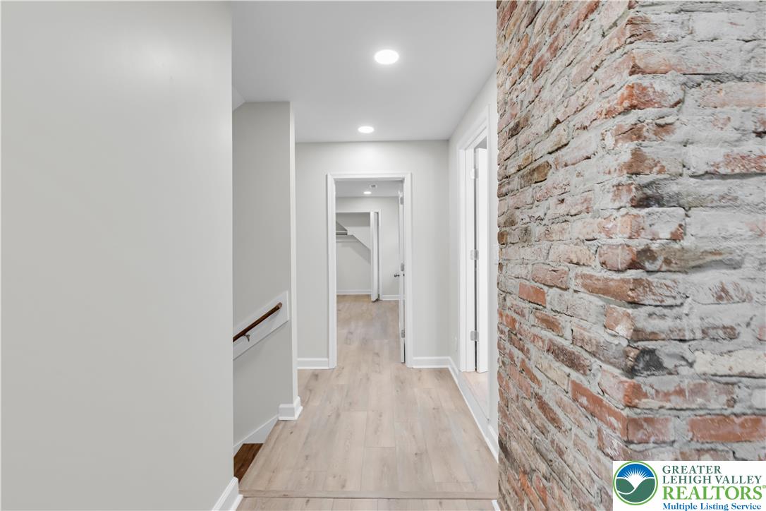 4453 Old Bethlehem Pike Center Valley, PA 18034 - Photo 21 of 28 a view of a hallway with wooden floor and staircase