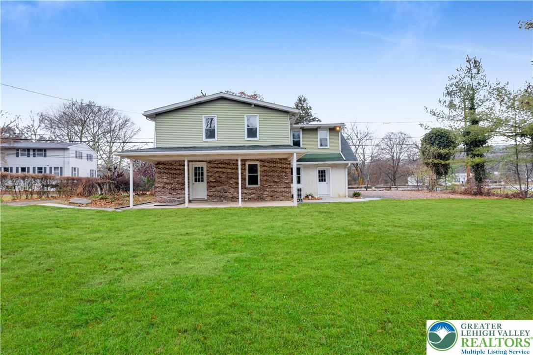 4453 Old Bethlehem Pike Center Valley, PA 18034 - Photo 4 of 28 a view of a house with a backyard