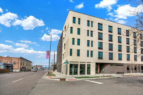 a front view of a building with street view
